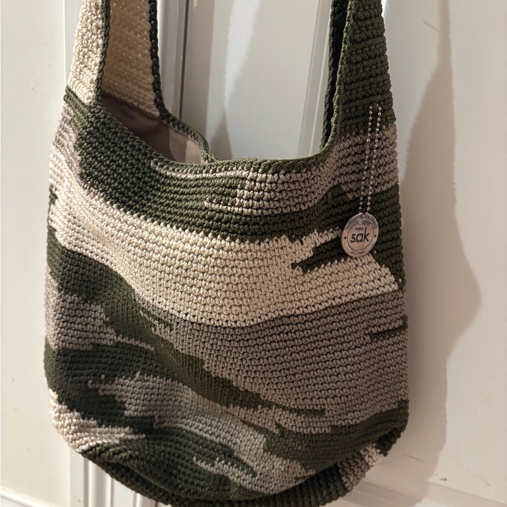 The Sak Crochet Hobo Bag in Olive Green and Cream